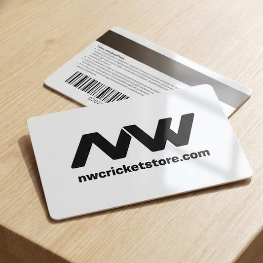 NW cricket store business card with barcode on a wooden surface